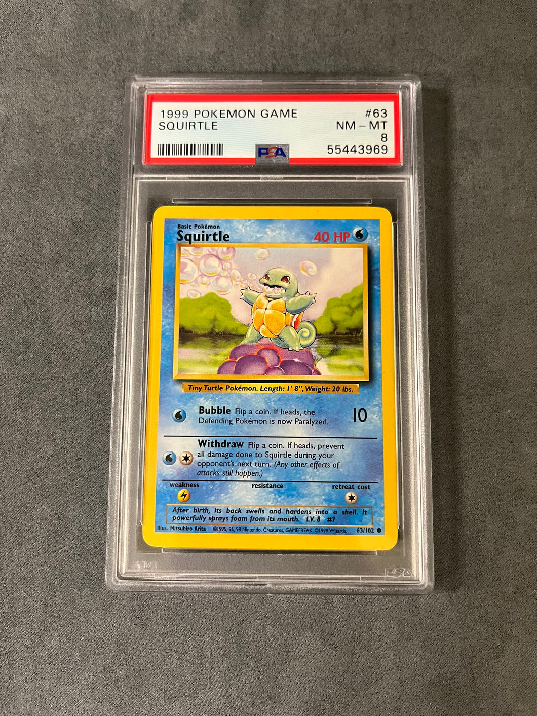 PSA 8 NM-MT 63/102 SQUIRTLE